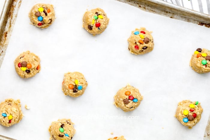Monster Cookies unbaked on a baking tray