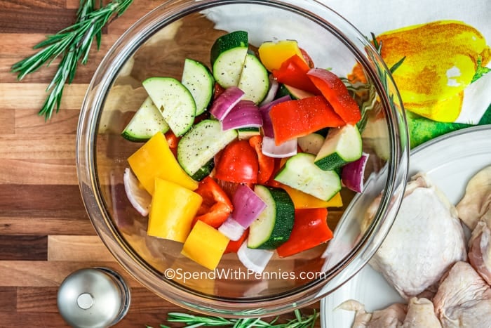 Overhead shot of fresh cut vegetables in a mixing bowl