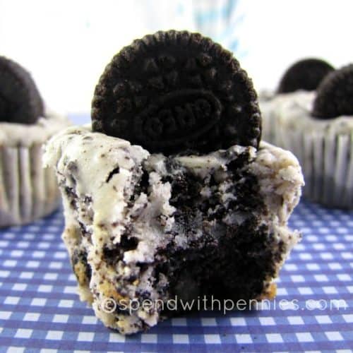 closeup of a oreo cheesecake cupcake with an Oreo on the top