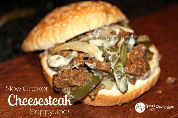 slow cooker cheesesteak sloppy joes on a board