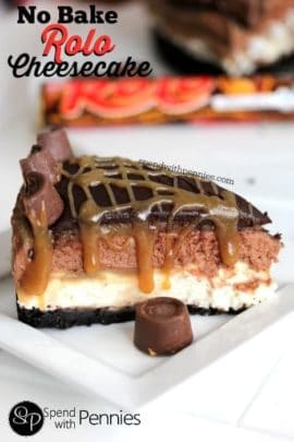 a slice of No Bake Rolo Cheesecake with caramel on it and a roll beside it