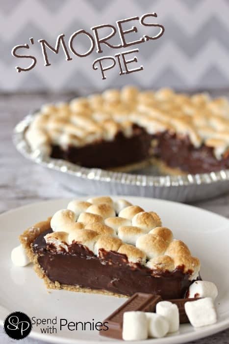 smores pie topped with marshmallows with a pie plate in the background