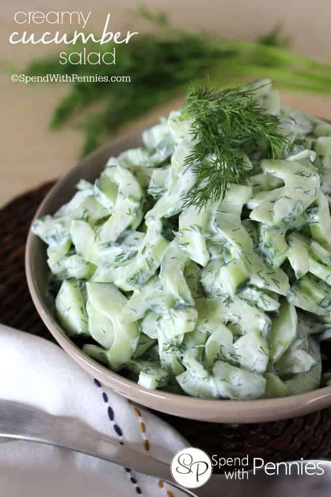 a bowl full of Creamy Cucumber salad with dill