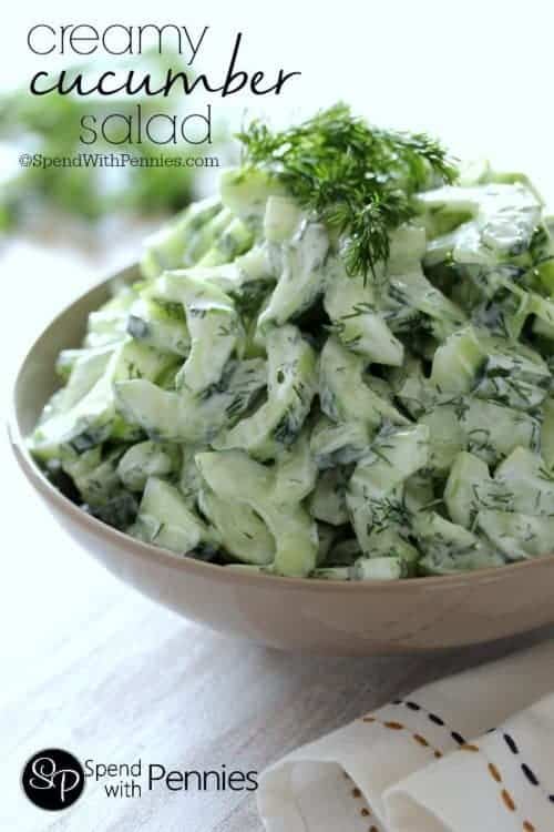 Creamy Cucumber salad with dill in a bowl garnished with fresh dill