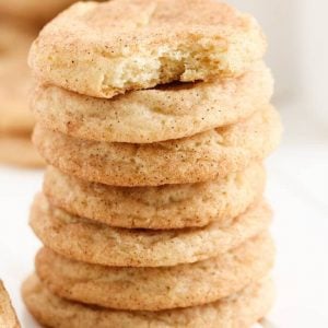 easy snickerdoodles in a stack with a bite out of it
