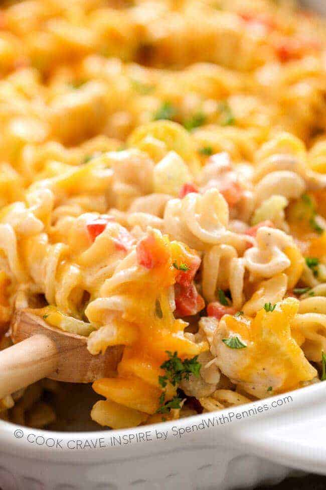 getting a scoop of Ranch Buffalo Pasta Bake loaded with pasta, chicken, and cheese in a creamy buffalo ranch sauce