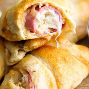 Stacked Reuben Roll Ups with the top one broken open