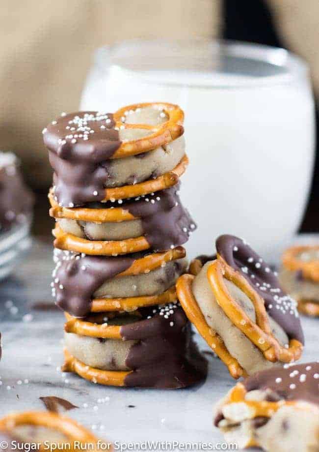 stack of Easy Cookie Dough Pretzel Bites, egg-free cookie dough sandwiched between pretzels and dipped in dark chocolate