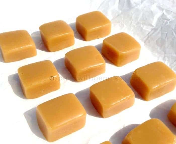 6 minute caramels laid out on parchment paper