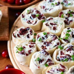 Cranberry Feta Pinwheels on a wood plate