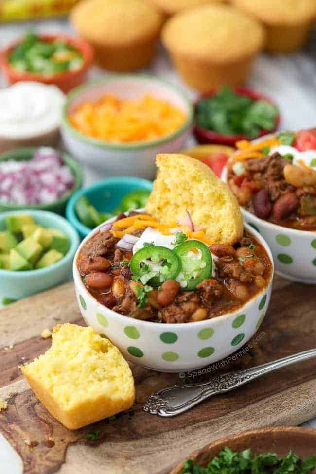 15 Bean Slow Cooker Chili with cornbread muffins and toppings