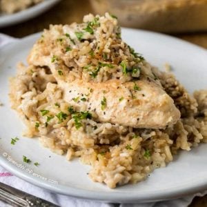 Chicken & Rice Casserole on a plate garnished with parsley