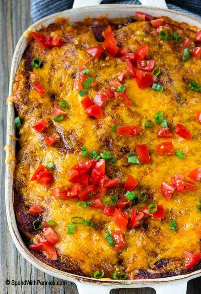 beef enchilada casserole in a white casserole dish