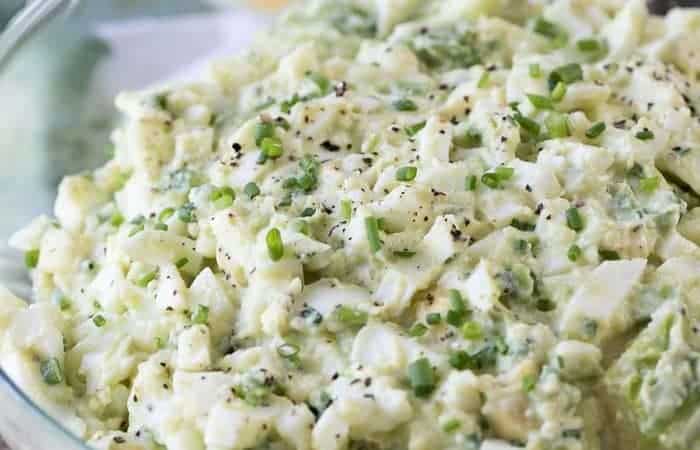 creamy avocado egg salad in bowl