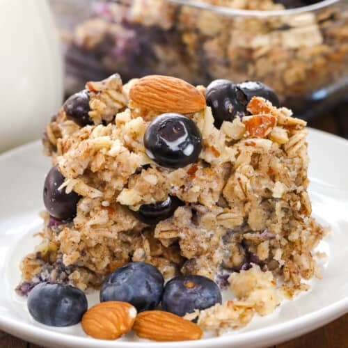 blueberry baked oatmeal on a plate with almonds