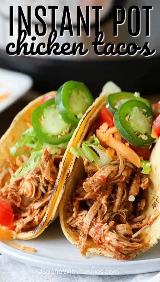 Instant Pot Chicken Tacos on a plate with writing