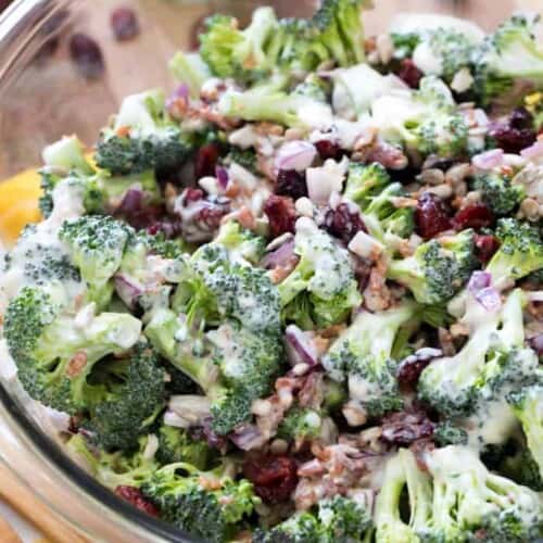 broccoli salad in a bowl with dressing