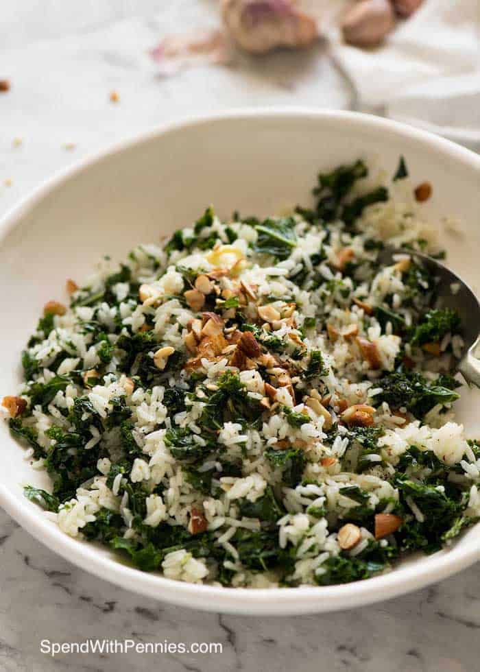 Garlic Butter Kale Rice in a bowl with a spoon