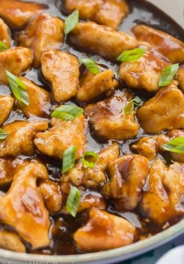 orange chicken close up in pan