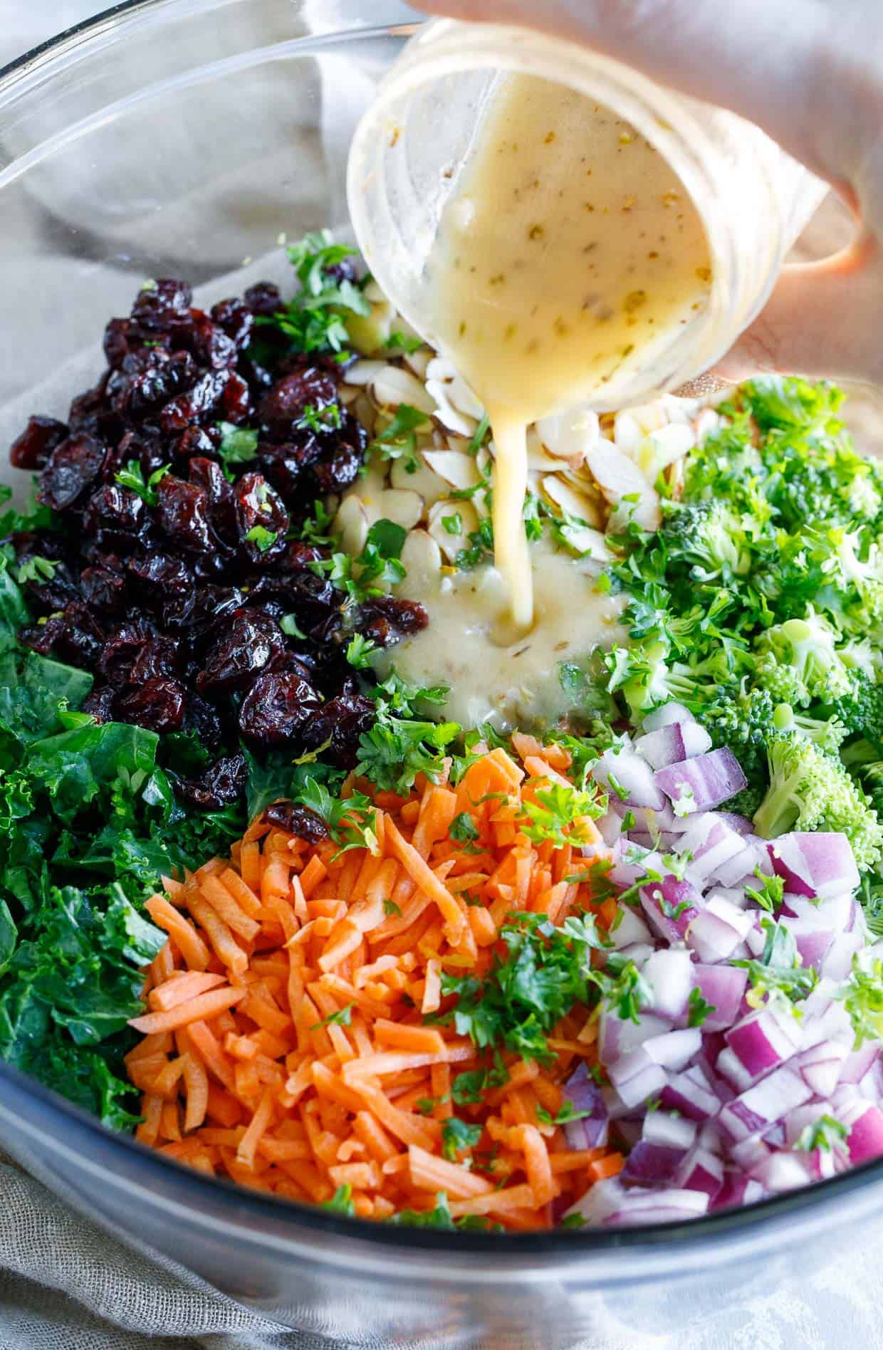 Easy kale salad is perfect for the weather we've been having lately! It's fresh, delicious, and totally make-ahead so feel free to prep this bad boy the night before and pack it along in lunches the next day if you'd like! #kalesalad #salad #healthy #spendwithpennies Easy Kale Salad with Salad Dressing