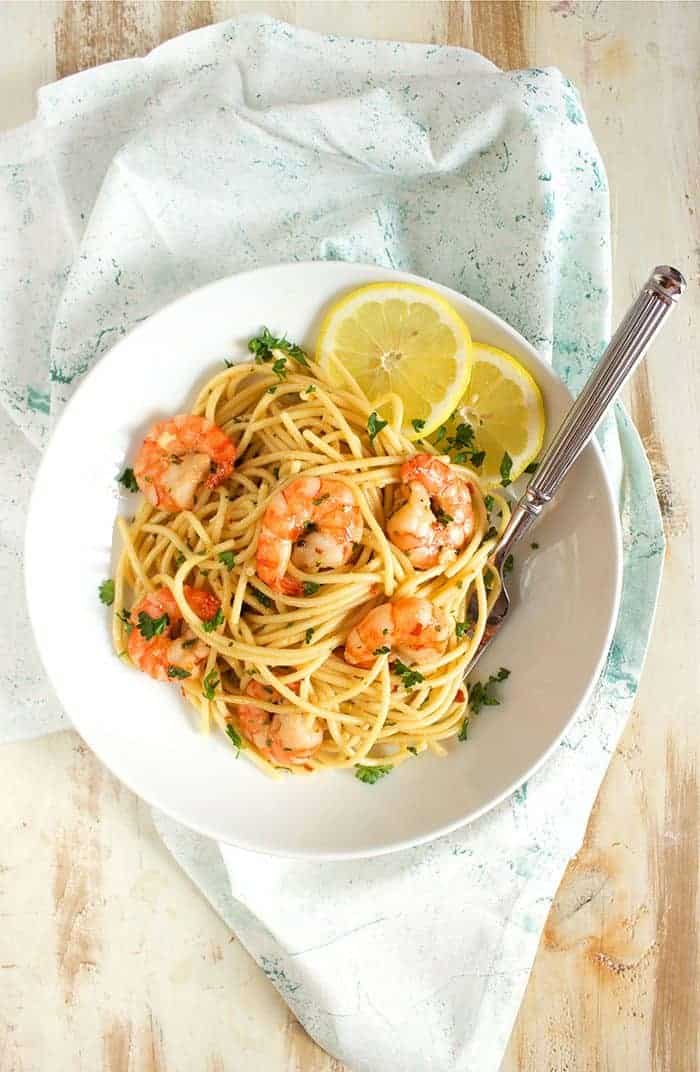 Overhead shot of Shrimp Scampi in a white bowl