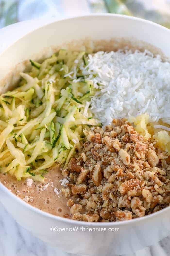 Zucchini Cake ingredients in a white bowl