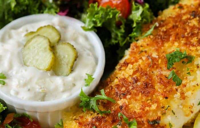 parmesan crusted tilapia with bowl of tartar sauce