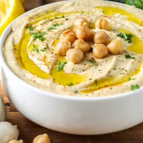 Hummus in a white bowl