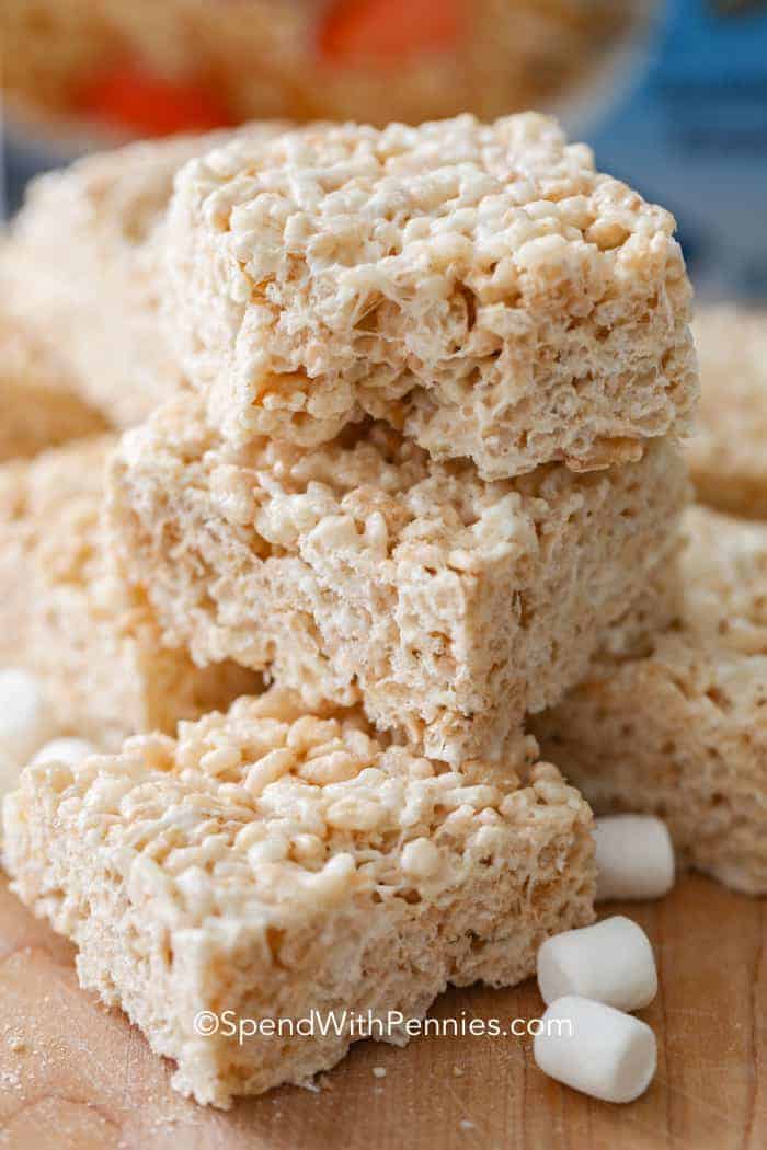 A stack of Rice Krispie treats with a bite out of one