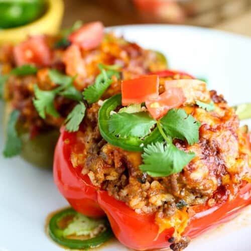 A taco stuffed pepper on a white plate