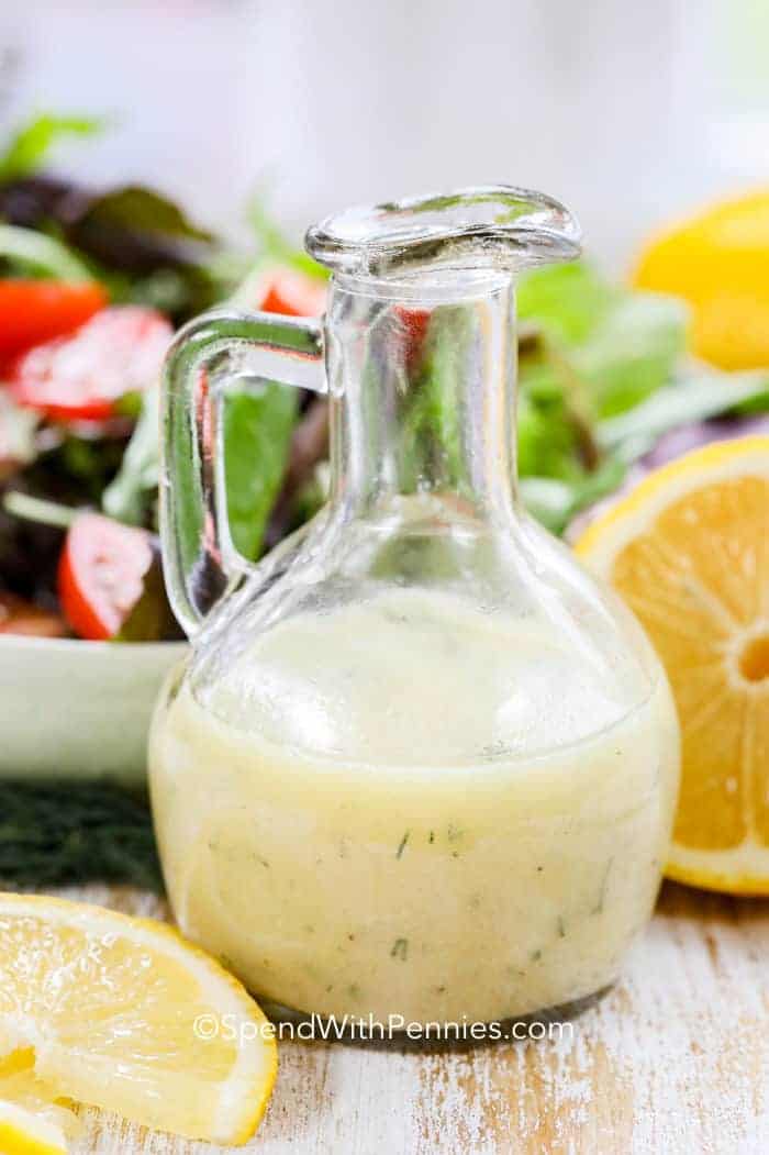 Lemon Vinaigrette in a jar with lemon slices