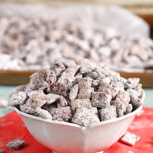 Chocolate Peanut Butter Muddy Buddies in a white bowl