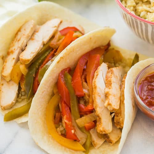 crock pot chicken fajitas in tortilla