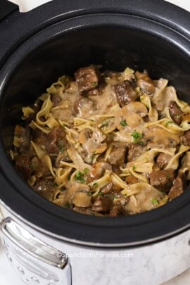 a slow cooker filled with crock pot beef stroganoff