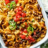 baked frito pie in a casserole dish