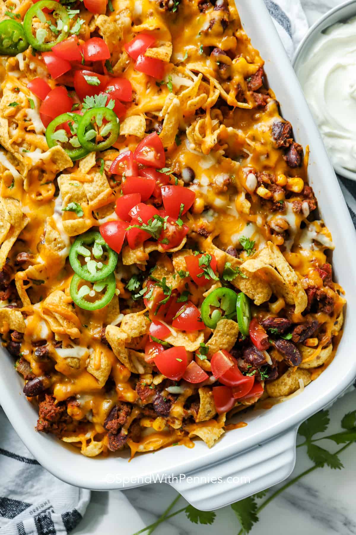 baked frito pie in a casserole dish 