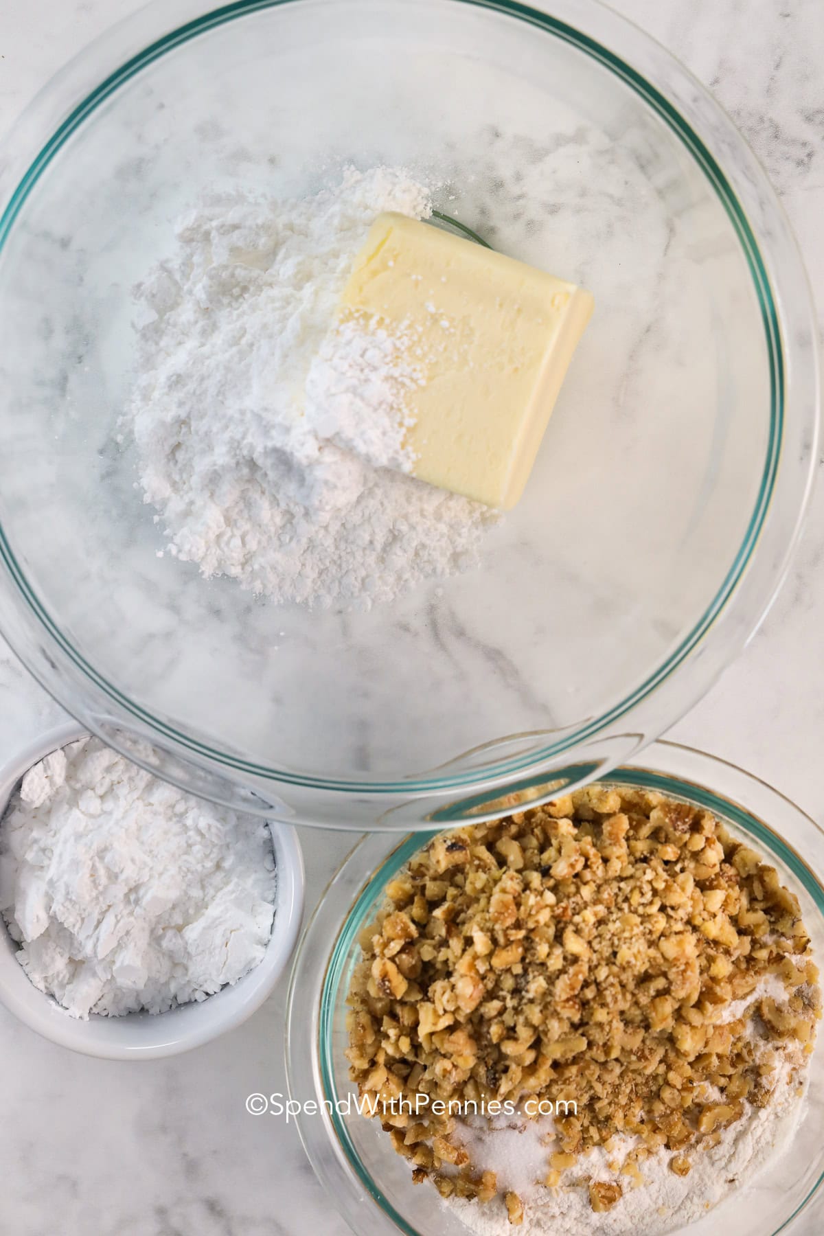 ingredients in a bowl for snowball cookies