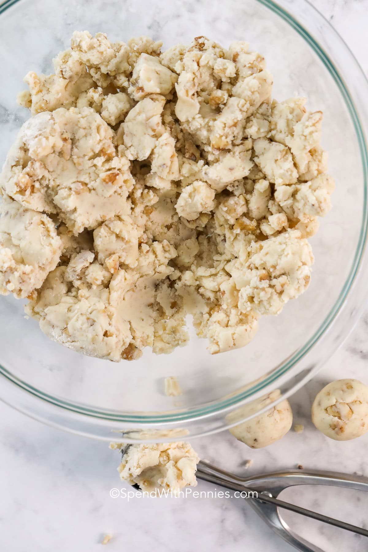 rolling dough for Snowball cookies