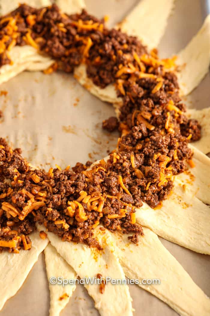 Taco Crescent Ring ingredients on a baking sheet