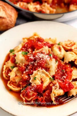 Garlic Tomato Tortellini in a white bowl