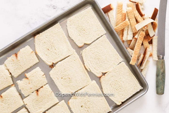 Slices of breadcrumbs on a baking sheet