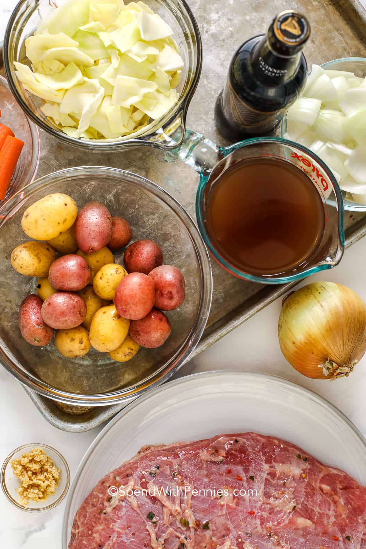 Corned beef brisket cooked in the Instant Pot is an easy and delicious way to enjoy it. Made with potatoes, cabbage, and carrots it is a must-try weeknight meal! #instantpotcornedbeef #cornedbeefbrisket #instantpot #spendwithpennies ingredients for making instant pot corned beef