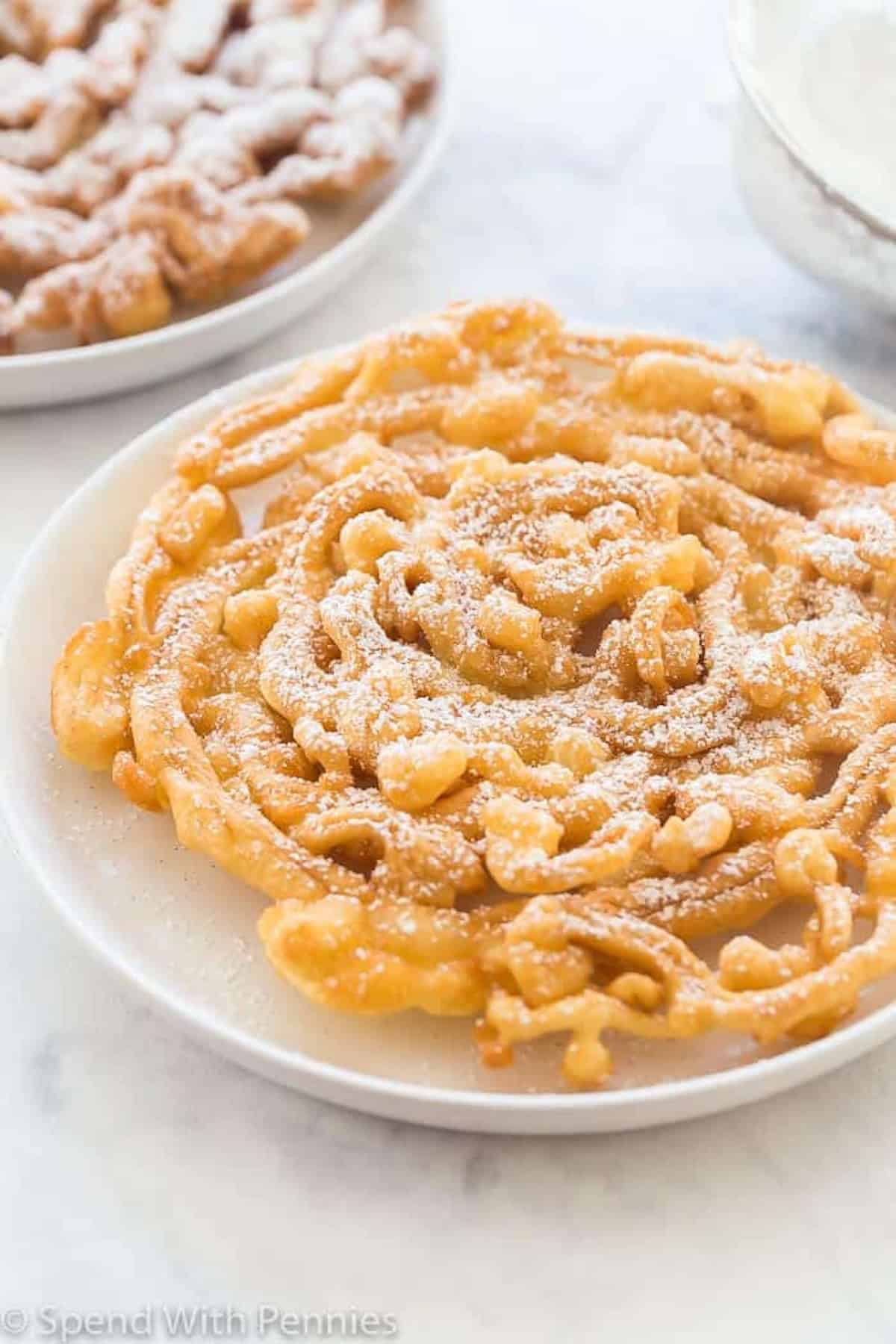 a funnel cake on a plate