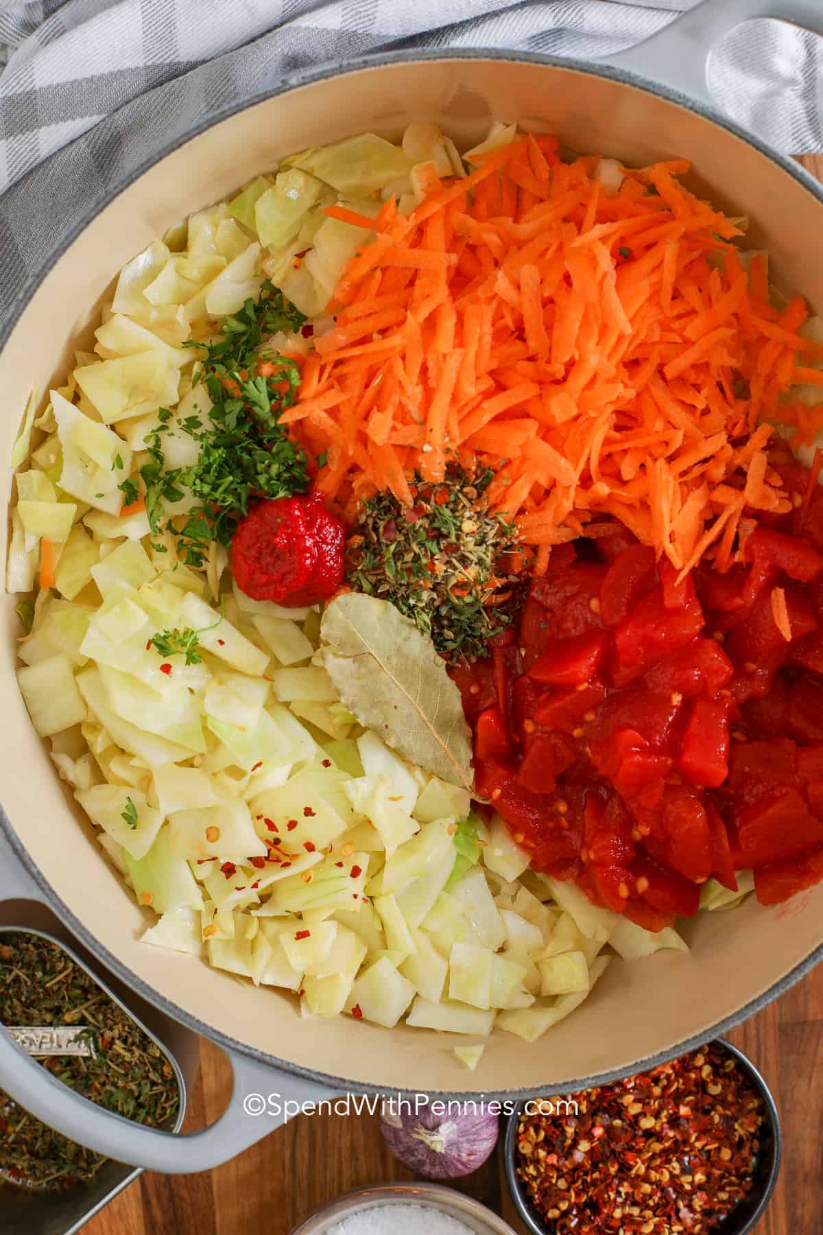 For a healthy and comforting dish try this hearty homemade cabbage soup recipe! It's a classic soup that's easy to cook up for a crowd. Chopped cabbage and seasonings simmer in a beefy tomato broth for a meal that’s both satisfying and budget-friendly. Bulk it up with ground beef, chicken, sausage, tofu, or make it meat-free. This belly-warming cabbage soup can be a main course, or low-carb starter. #spendwithpennies #cabbagesoup #cabbagesouprecipe #easycabbagesoup
