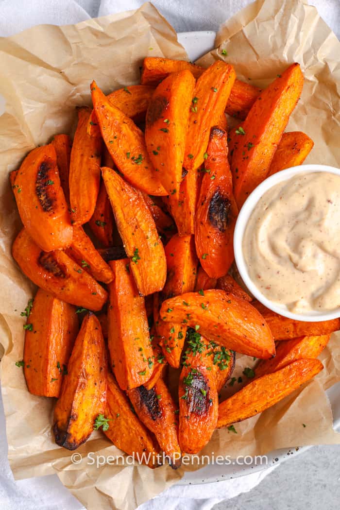 top view of Sweet Potato Wedges in a basket with dip