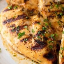 grilled chicken breasts on a plate