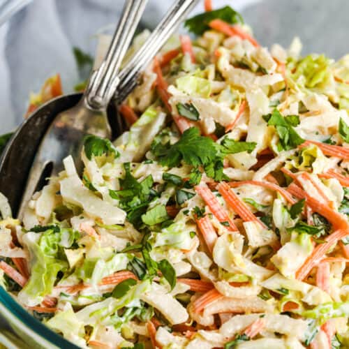 close up of Cilantro Lime Coleslaw in a glass bowl