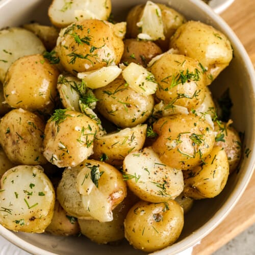 new potatoes with garlic and dill in a bowl