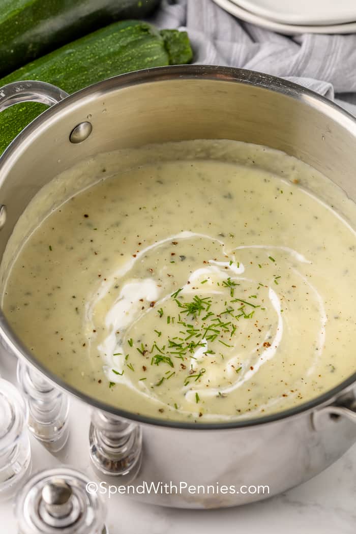 Zucchini Soup is creamy and comforting on a late summer or fall day! This soup is perfect for a quick weeknight meal or lunch on a busy weekend! #spendwithpennies #zucchinisoup #recipe #stovetop #homemade #creamy Zucchini Soup in a pot