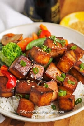 Baked Tofu in a bowl with rice and sesame seeds